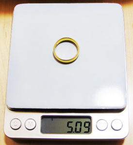 14 kt gold ring on kitchen scale